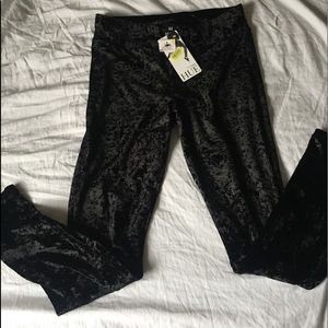 Black velvet skinny pants